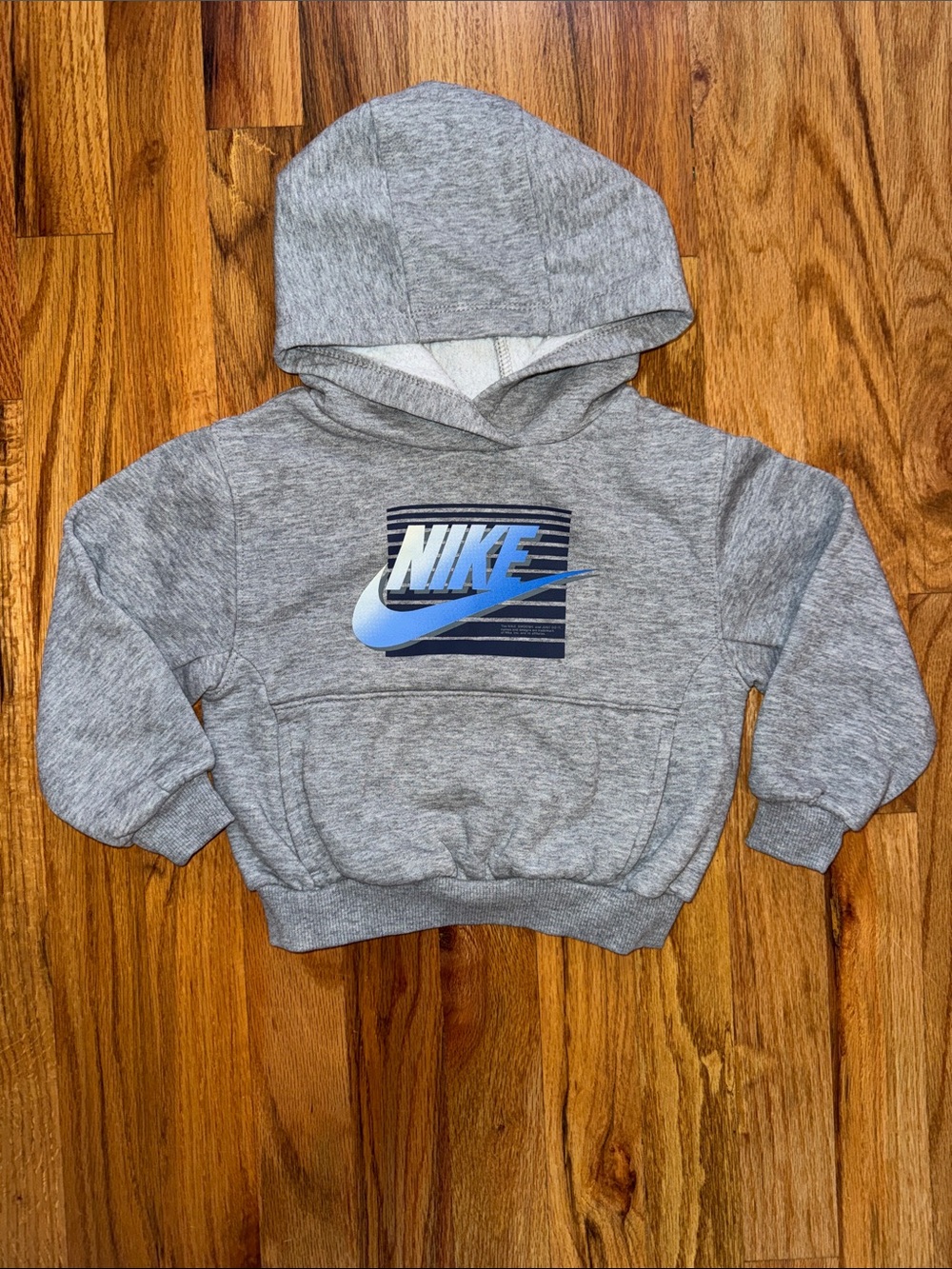 Nike Kids Grey Hoodie with Blue Logo Graphic